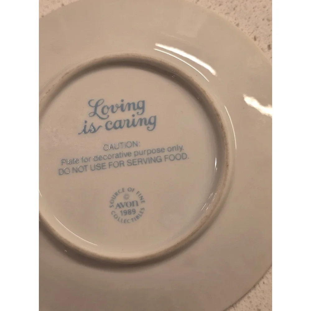 Set of 8 Avon Collectable Plates 1980s